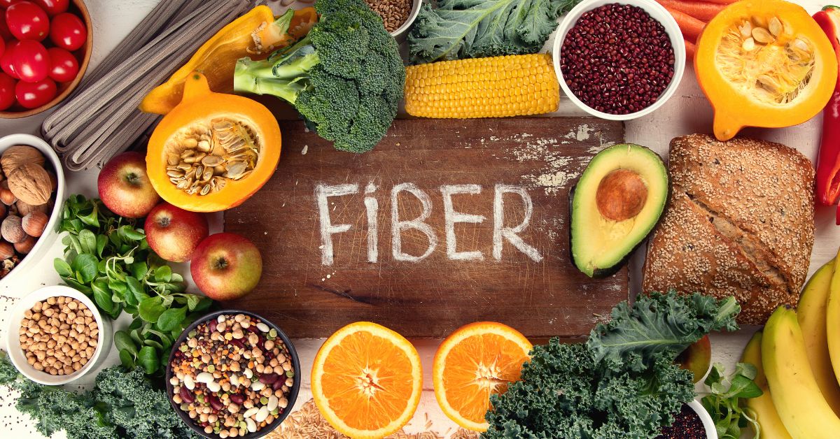 Assorted Fiber-Rich Foods Like Fruits Vegetables and Grains